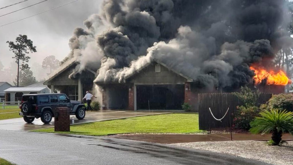 Navarre home in flames after bring struck by lightening