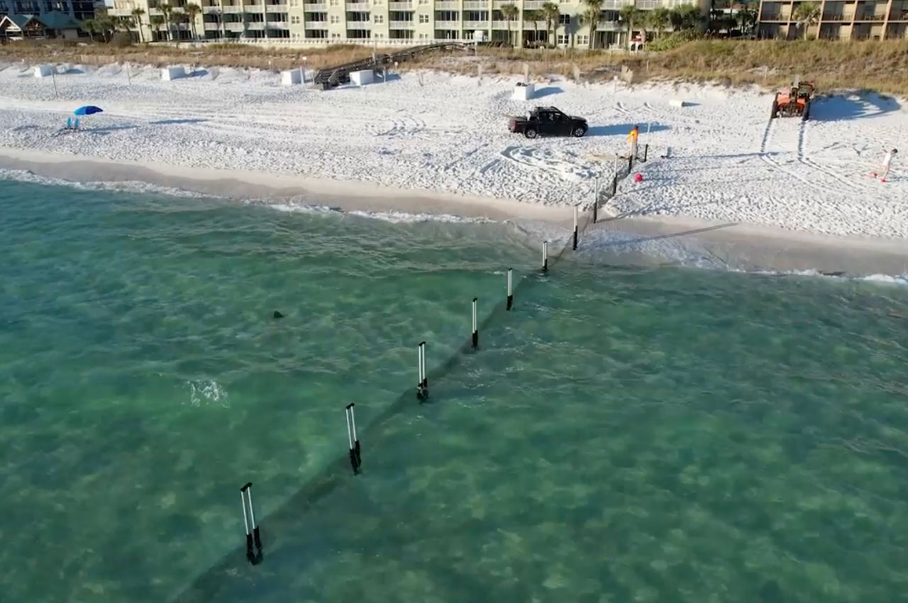 Beach enrichment project underway on Okaloosa Island to help accumulate ...